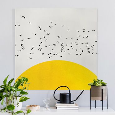 Leinwandbild - Vogelschwarm vor gelber Sonne - Quadrat 1:1
