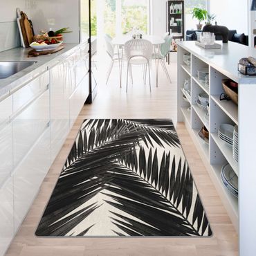 Teppich - Blick durch Palmenblätter schwarz weiß