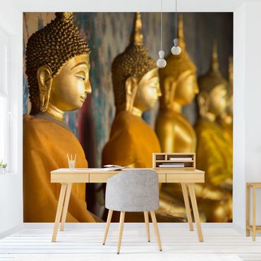 Fototapete - Goldene Buddha Statuen