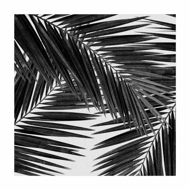 Teppich Blumen Blick durch Palmenblätter schwarz weiß