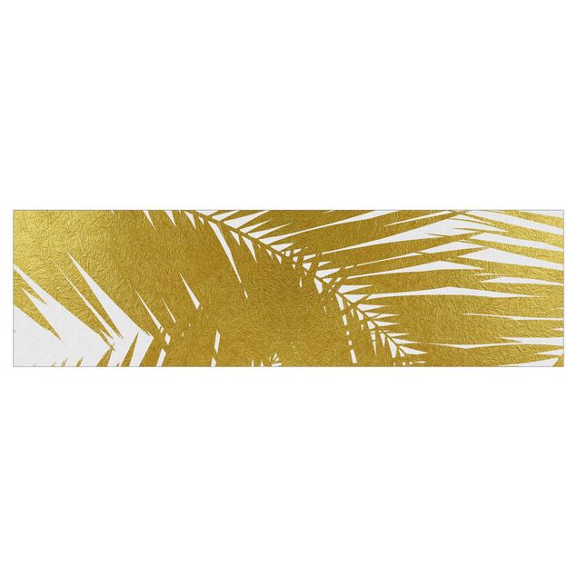 Selbstklebende Folie Blick durch goldene Palmenblätter
