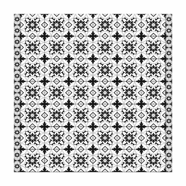 Teppich modern Geometrischer Fliesenmix Blume Schwarz