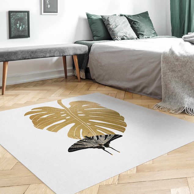 Teppiche Goldene Monstera mit Schmetterling