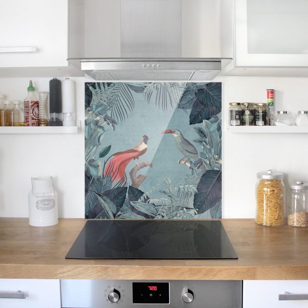 Küchenrückwand Glas Motiv Blumen Blaugraues Paradies mit tropischen Vögeln