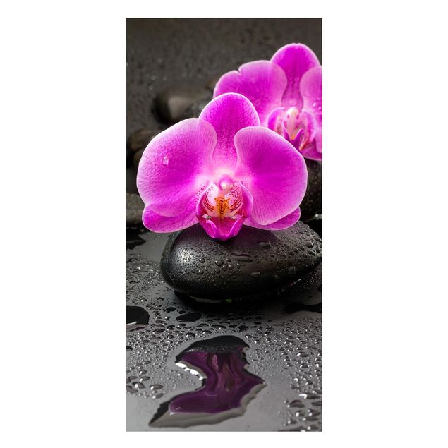 Magnettafel Steinoptik Pinke Orchideenblüten auf Steinen mit Tropfen