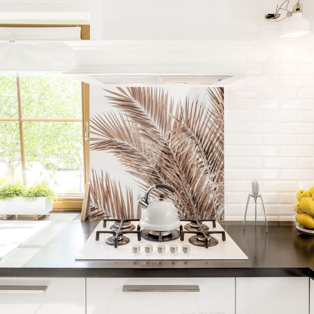 Küchenrückwand Glas Blumen Bronzefarbene Palmenwedel