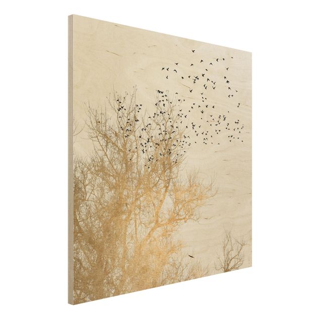 Holzbilder Landschaften Vogelschwarm vor goldenem Baum