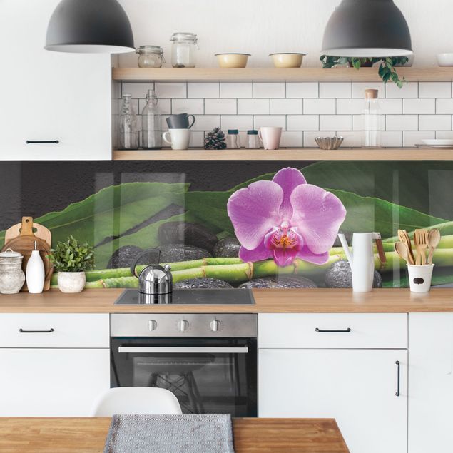 Küchenrückwand Blumen Grüner Bambus mit Orchideenblüte
