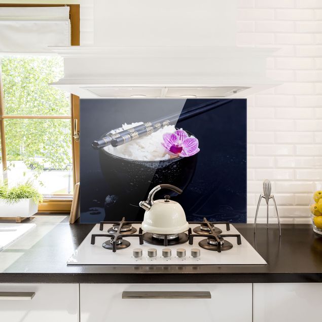 Küchenrückwand Glas Motiv Blumen Reisschale mit Orchidee