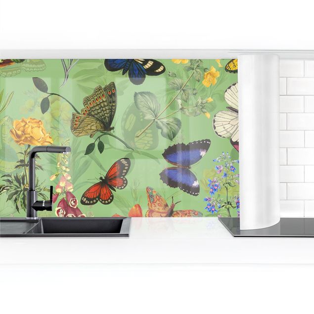 Glasrückwand Küche Muster Schmetterlinge mit Blumen auf Grün