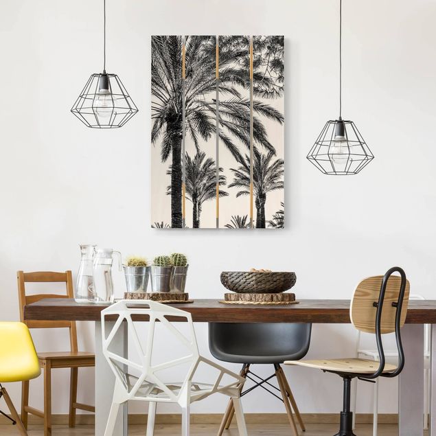 Moderne Holzbilder Palmen im Sonnenuntergang Schwarz-Weiß