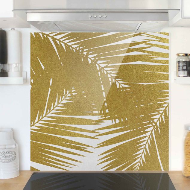 Spritzschutz Glas magnetisch Blick durch goldene Palmenblätter