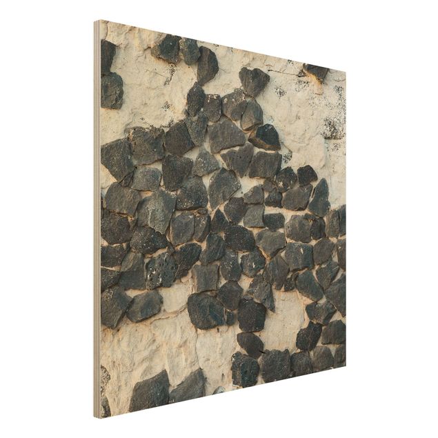 Moderne Holzbilder Mauer mit Schwarzen Steinen