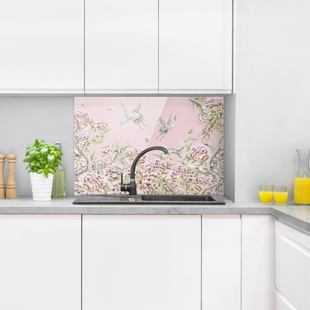 Küchenrückwand Glas Motiv Blumen Aquarell Störche im Flug mit Rosen auf Rosa