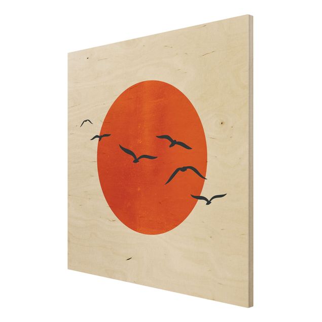 Wandbild Holz Vogelschwarm vor roter Sonne I
