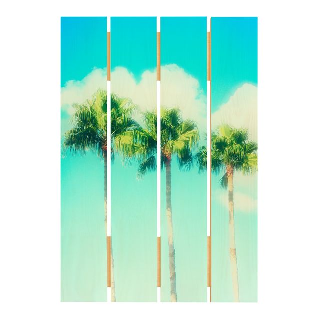 Holzbilder Palmen vor Himmel Blau