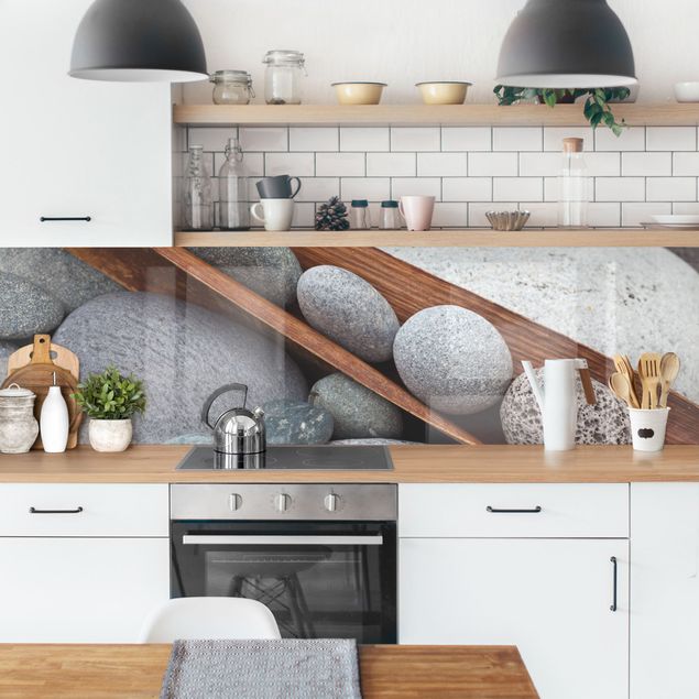 Küchenrückwand Folie Steinoptik Stillleben mit grauen Steinen