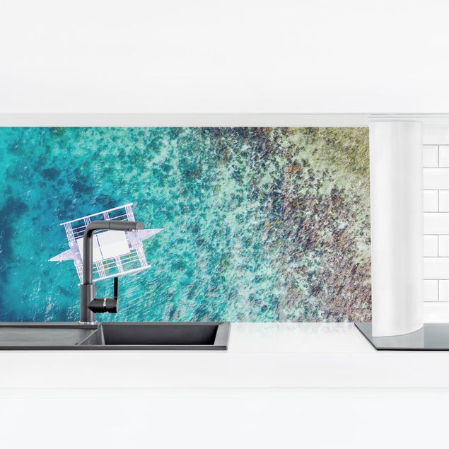 Küchenrückwand Glas Motiv Wald Boot auf dem Meer Draufsicht
