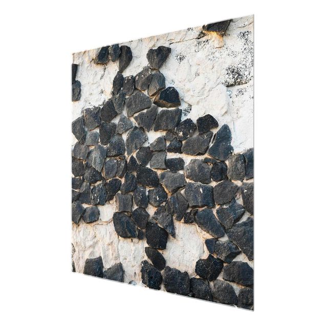 Glasbild - Mauer mit Schwarzen Steinen - Quadrat 1:1