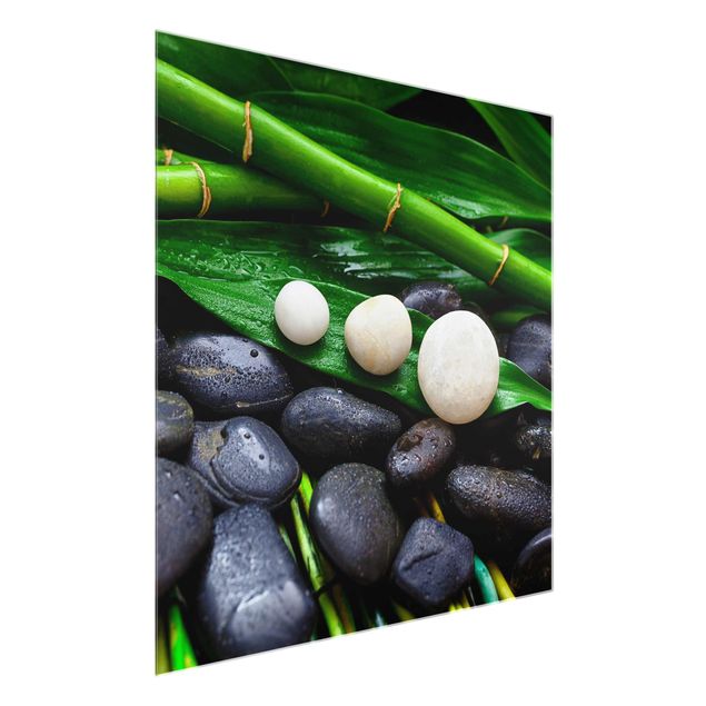 Glasbild Grün Grüner Bambus mit Zen Steinen