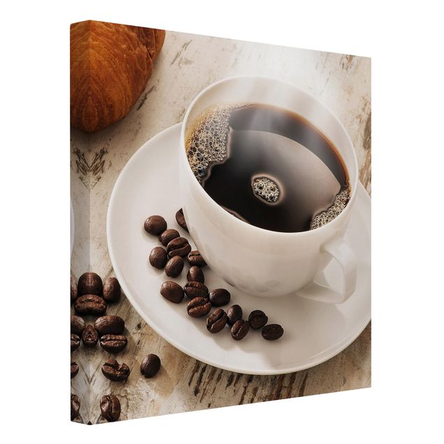 Leinwandbilder Dampfende Kaffeetasse mit Kaffeebohnen