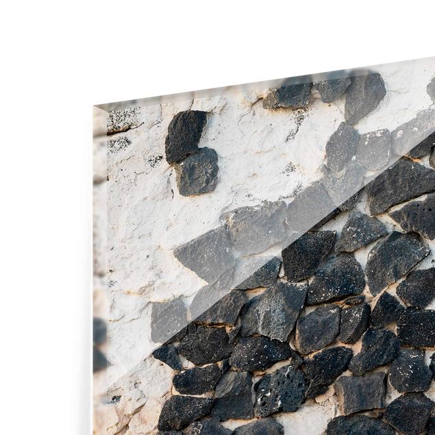 Glasbild - Mauer mit Schwarzen Steinen - Querformat 2:3