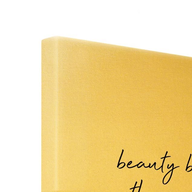 Leinwandbild Gold - Typografie Beauty Begins Zitat - Hochformat 3:4