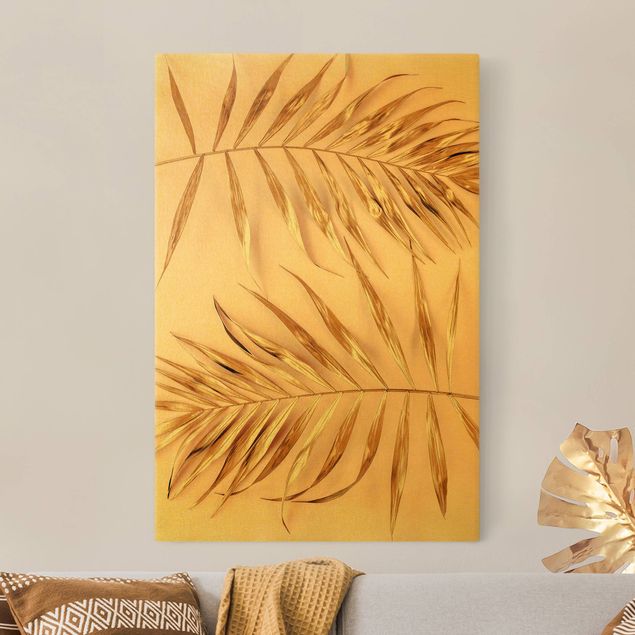 Leinwandbild Gold - Goldene Palmenblätter auf Rosa - Hochformat 2:3