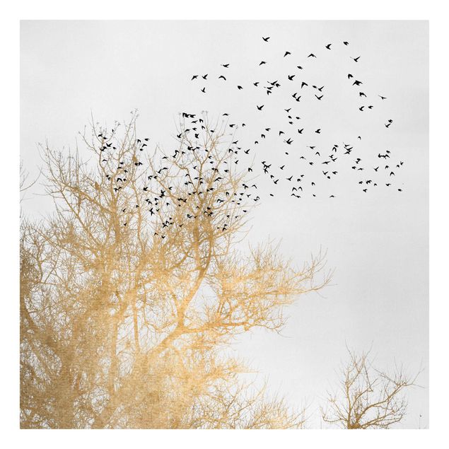 Leinwandbilder Wald Vogelschwarm vor goldenem Baum
