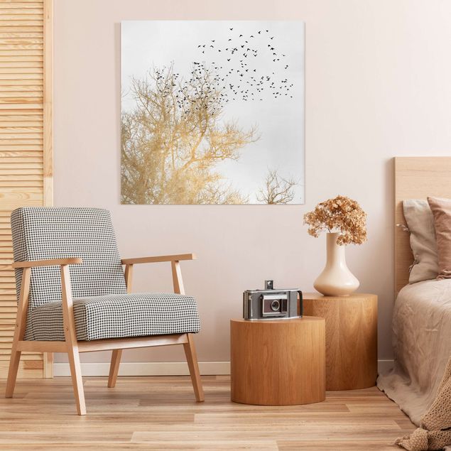 Wandbilder Vögel Vogelschwarm vor goldenem Baum