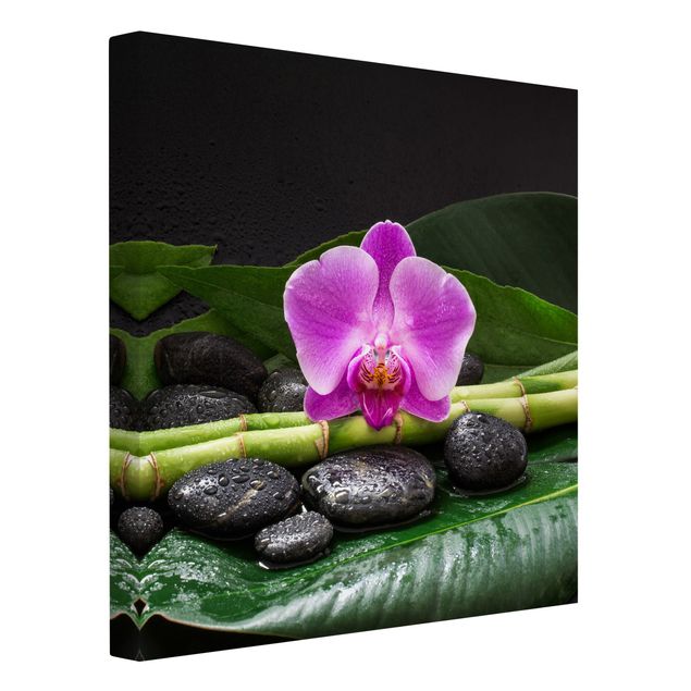 Kunstdrucke auf Leinwand Grüner Bambus mit Orchideenblüte