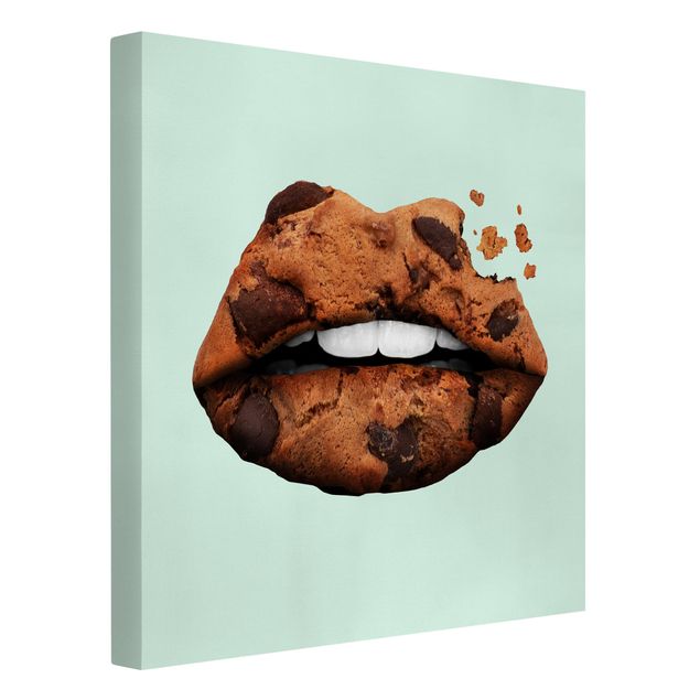 Leinwandbilder Lippen mit Keks