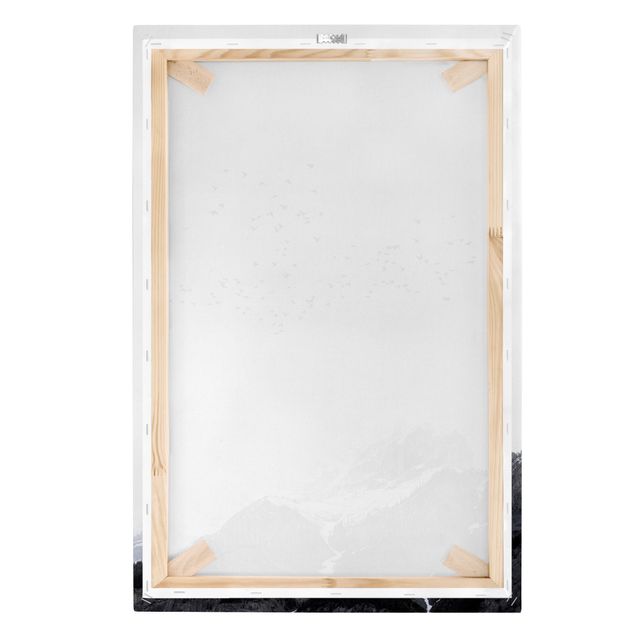 Leinwandbild Kunstdruck Vogelschwarm vor Bergen Schwarz Weiß