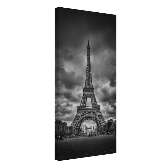 Wandbilder Städte Eiffelturm vor Wolken schwarz-weiß