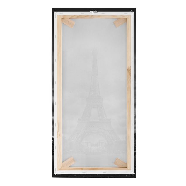 Schöne Leinwandbilder Eiffelturm vor Wolken schwarz-weiß