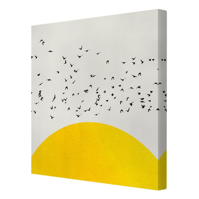 Leinwand Kunstdruck Vogelschwarm vor gelber Sonne