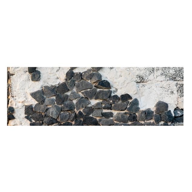 Leinwandbilder Mauer mit Schwarzen Steinen