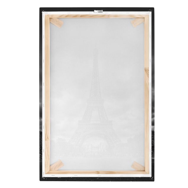 Bilder auf Leinwand Eiffelturm vor Wolken schwarz-weiß