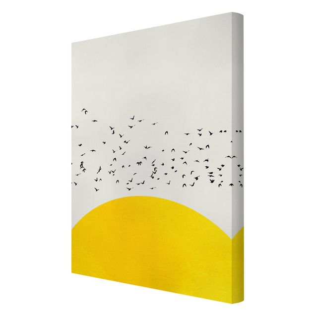 Kunstdrucke auf Leinwand Vogelschwarm vor gelber Sonne