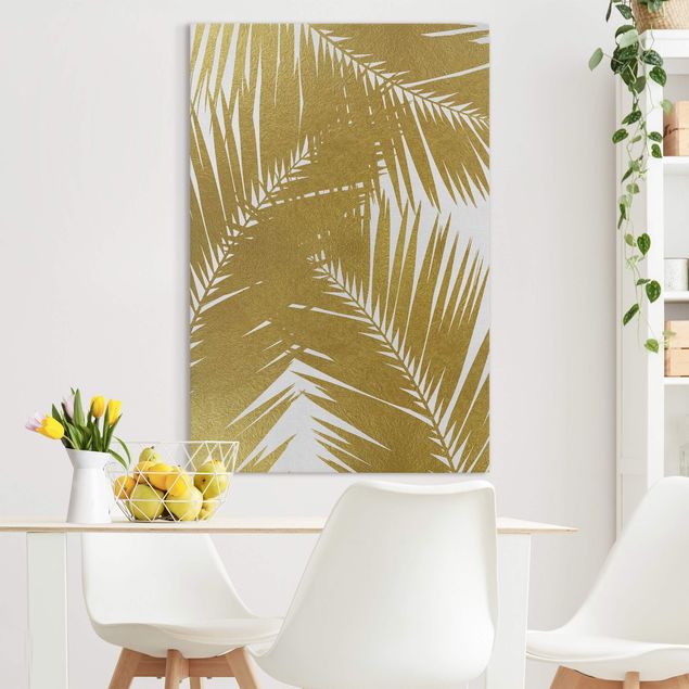 Wandbilder XXL Blick durch goldene Palmenblätter