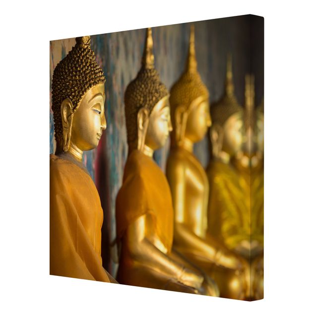 Leinwandbilder Wohnzimmer modern Goldene Buddha Statuen