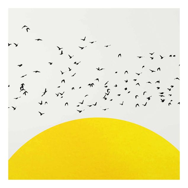 Glasbilder Landschaften Vogelschwarm vor gelber Sonne