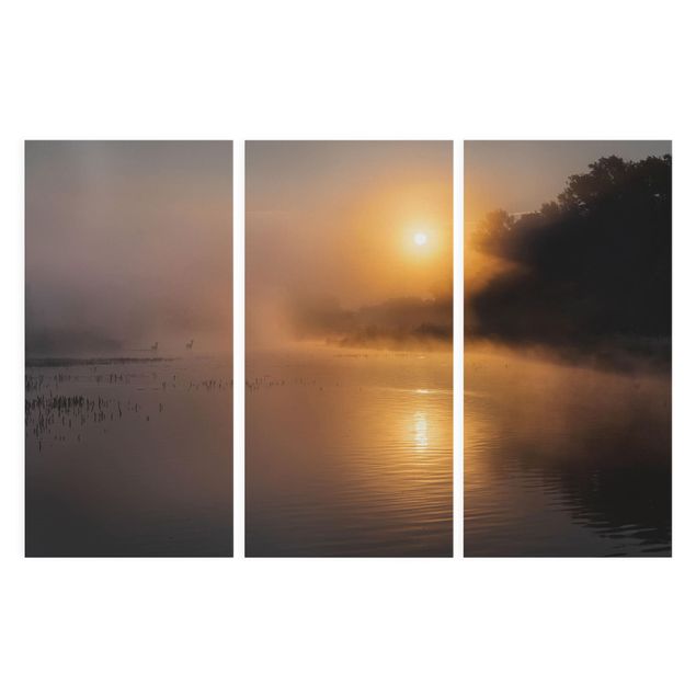 Moderne Leinwandbilder Wohnzimmer Sonnenaufgang am See mit Rehen im Nebel