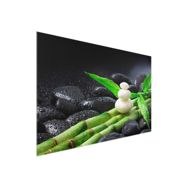 Glasbild Grün Weiße Steine auf Bambus