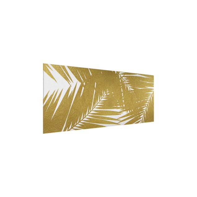 Wandbilder Blick durch goldene Palmenblätter