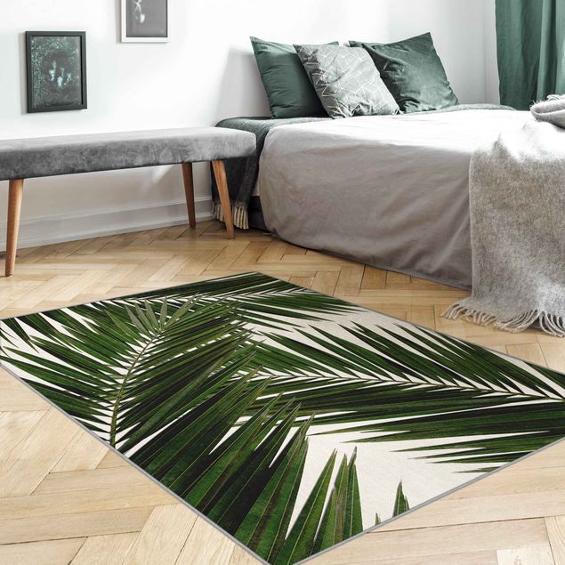 Teppiche Blick durch grüne Palmenblätter