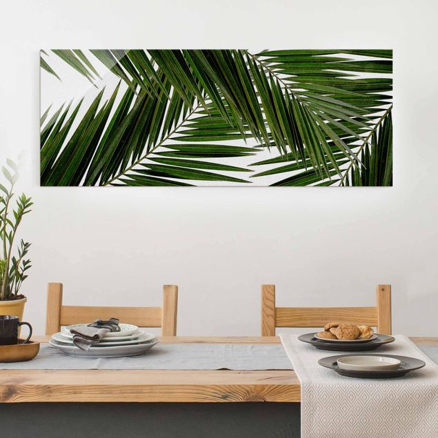 Wandbilder Glas XXL Blick durch grüne Palmenblätter