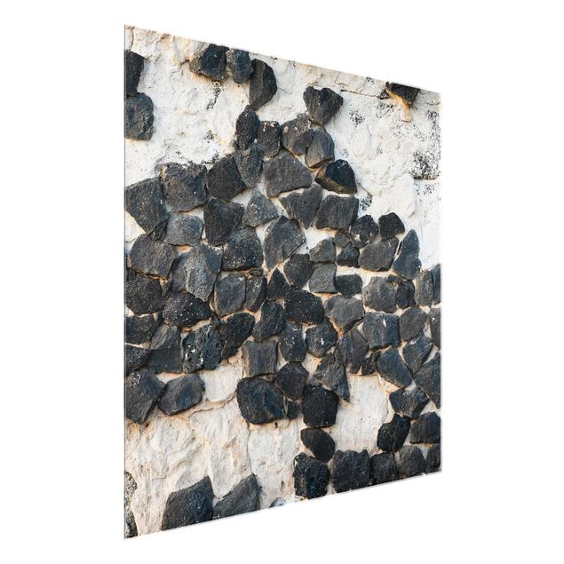 Glasbild - Mauer mit Schwarzen Steinen - Quadrat 1:1