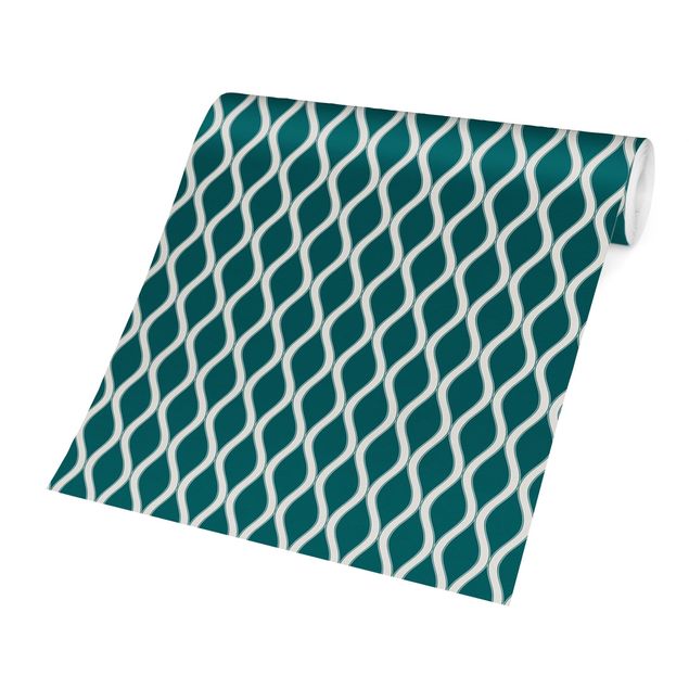 Tapeten modern Dunkles Retro Muster mit glänzenden Wellen in smaragd