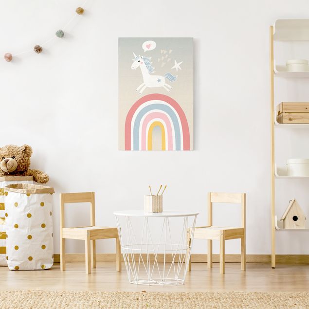 Wandbilder Tiere Einhorn auf Regenbogen in Pastell